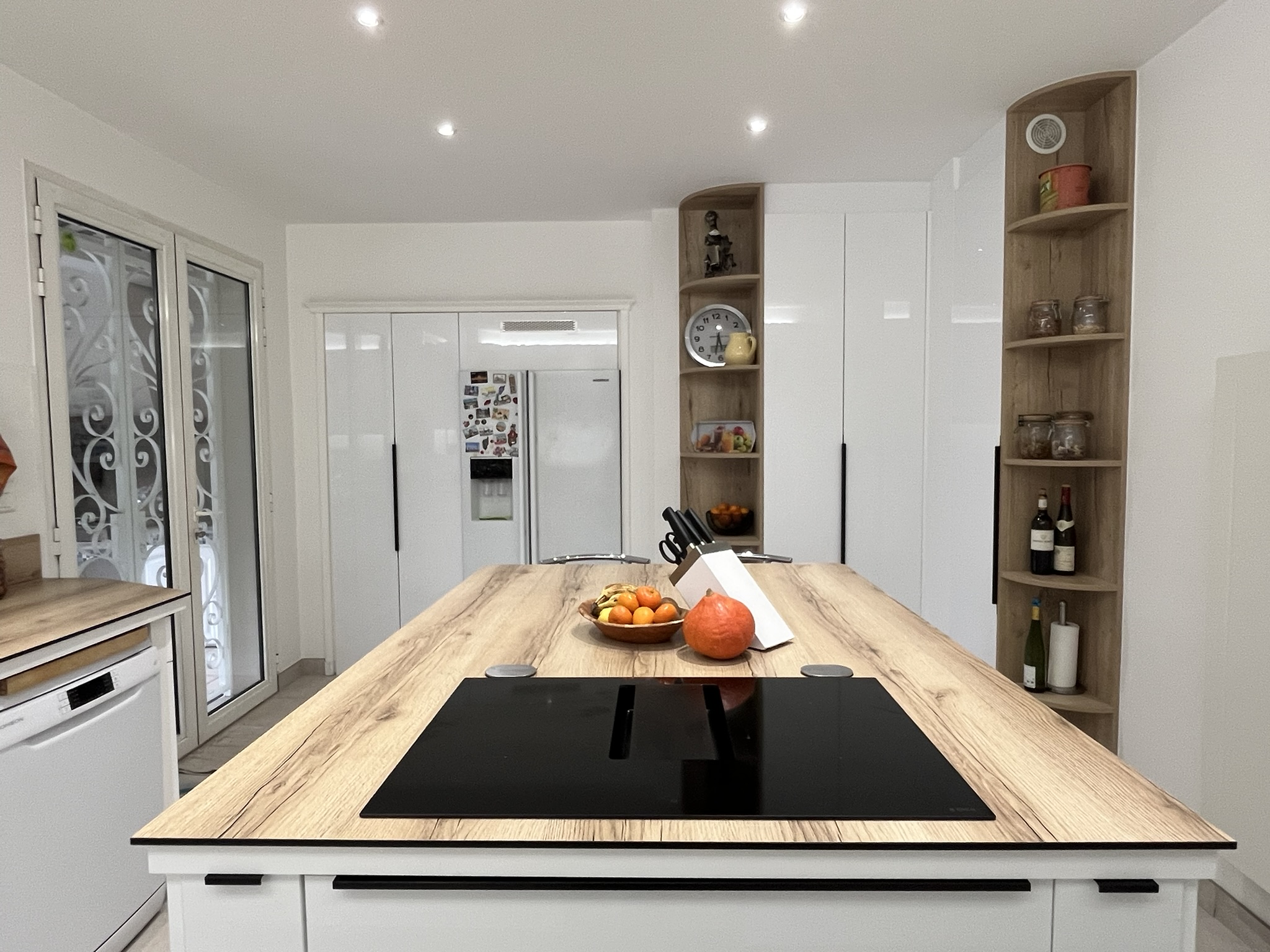 Photo de réalisation d'aménagement intérieur réalisée après travaux d'adaptation d'une cuisine