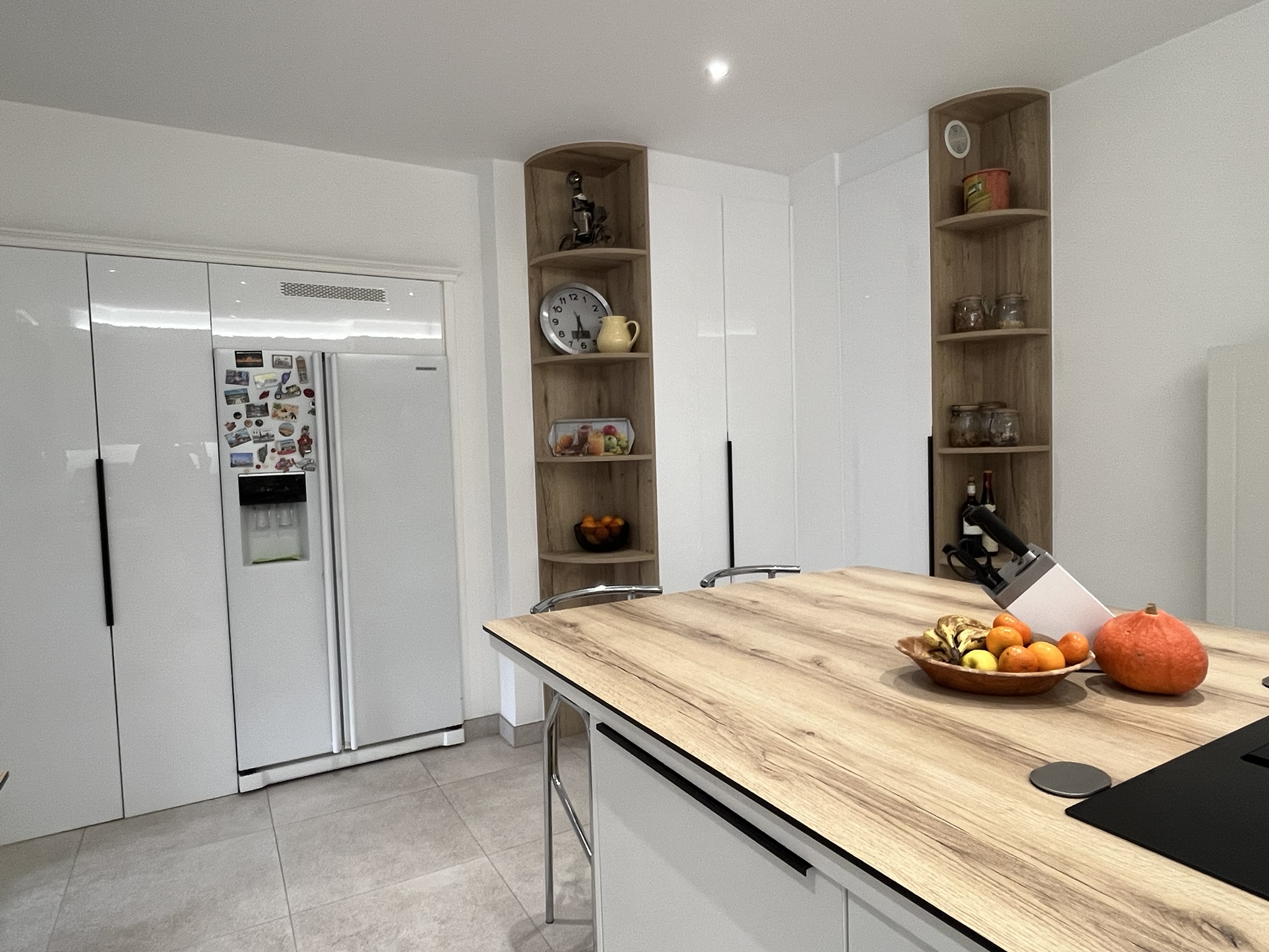 Photo de réalisation d'aménagement intérieur réalisée après travaux d'adaptation d'une cuisine